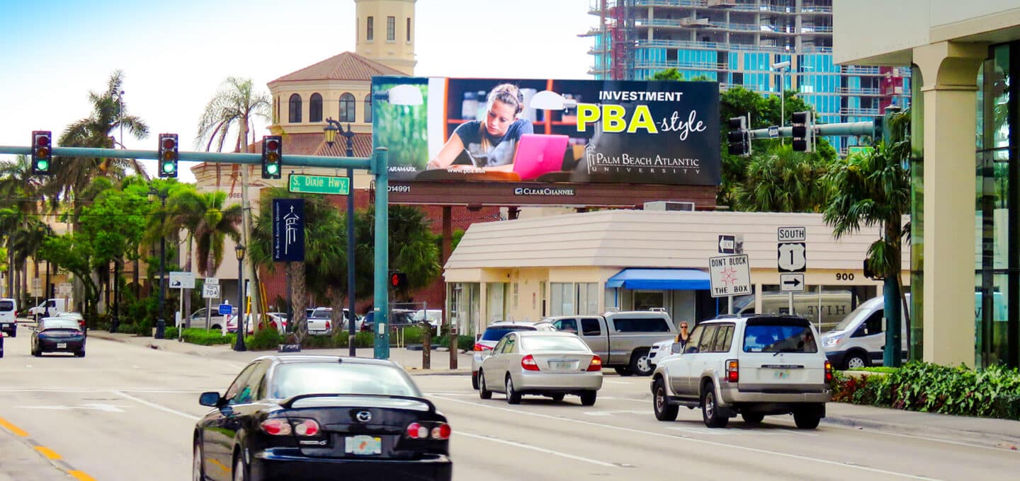 Clear Channel Outdoor billboard on busy roadway 