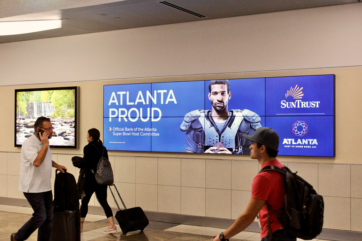 Sun Trust - Atlanta Proud on concourse of Atlanta airport