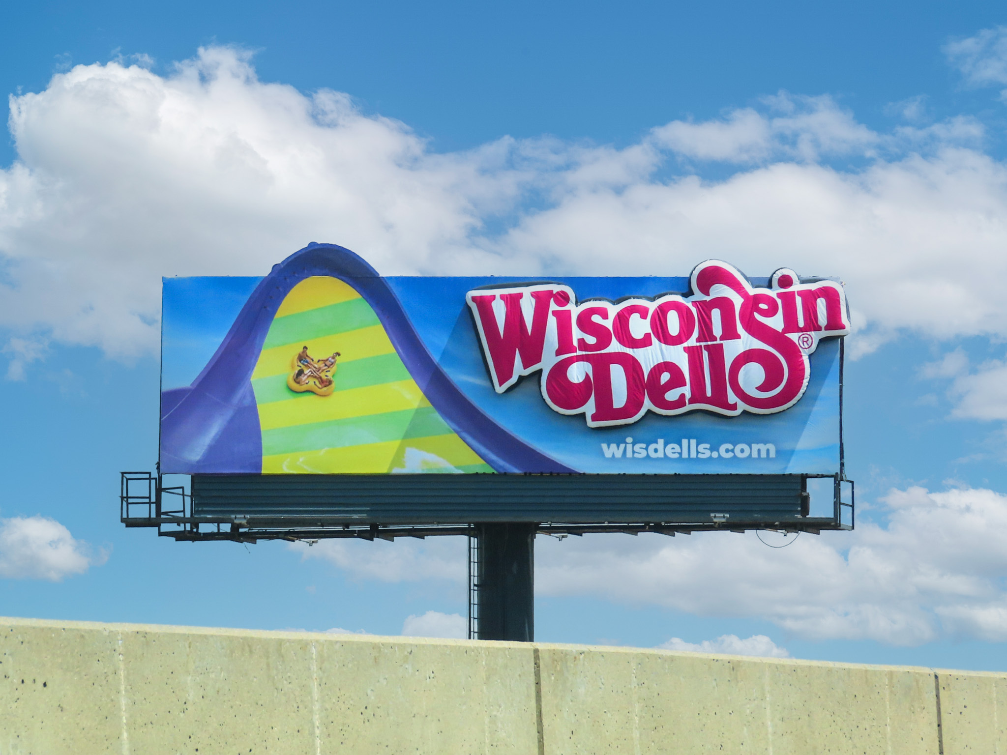Wisconsin Dells Visitors Convention Bureau, using big bold typography and bright colors