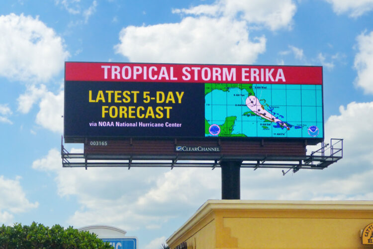 Live announce of Tropical Storm Erika, storm warnings - public announcement
